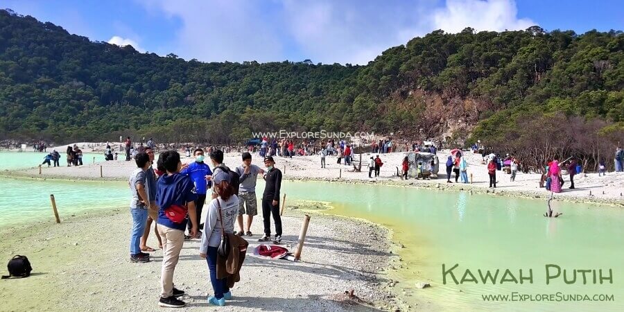 At the bottom of Kawah Putih lies a beautiful volcanic lake. At the bottom of Kawah Putih lies a beautiful volcanic lake.
