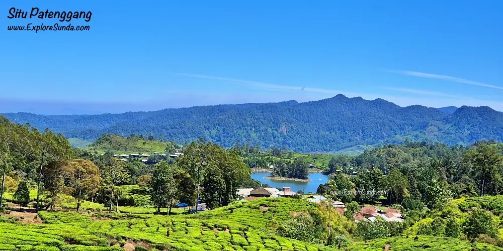 Situ Patenggang surrounded by the Rancabali tea plantation, with Glamping Lakeside Rancabali looking like tiny white dots along its shore.