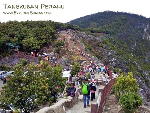 Visitors are walking on the perimeters of Kawah Ratu (Queen Crater) at Mount Tangkuban Perahu.